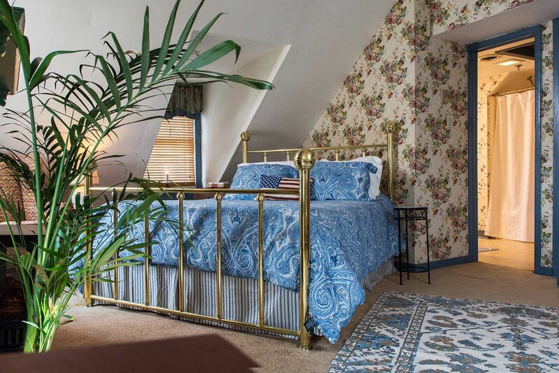 Pennington room with bed and view of bathrom